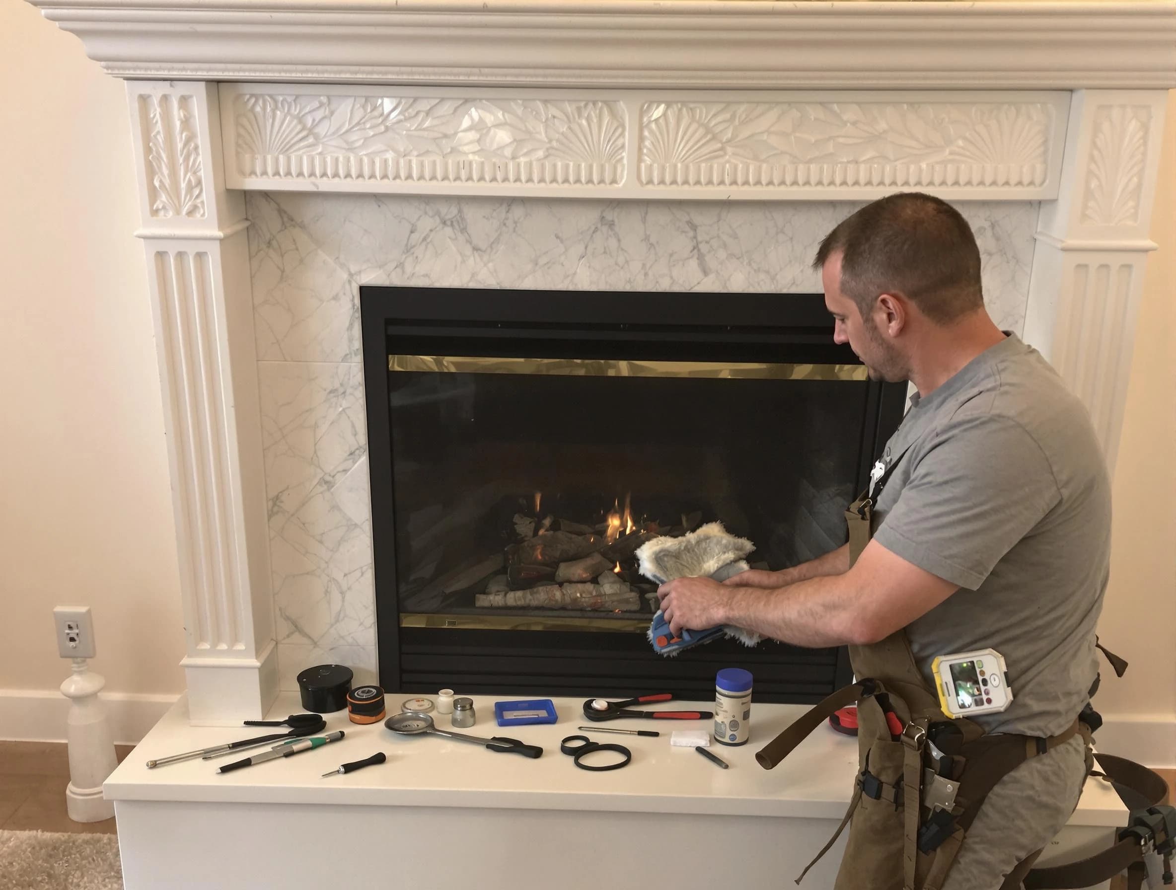 Tuckahoe Chimney Sweep performing fireplace maintenance in Tuckahoe, VA